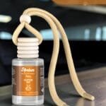 a - DIFUSOR AUTO GLITTER BOT 10ML AMBAR